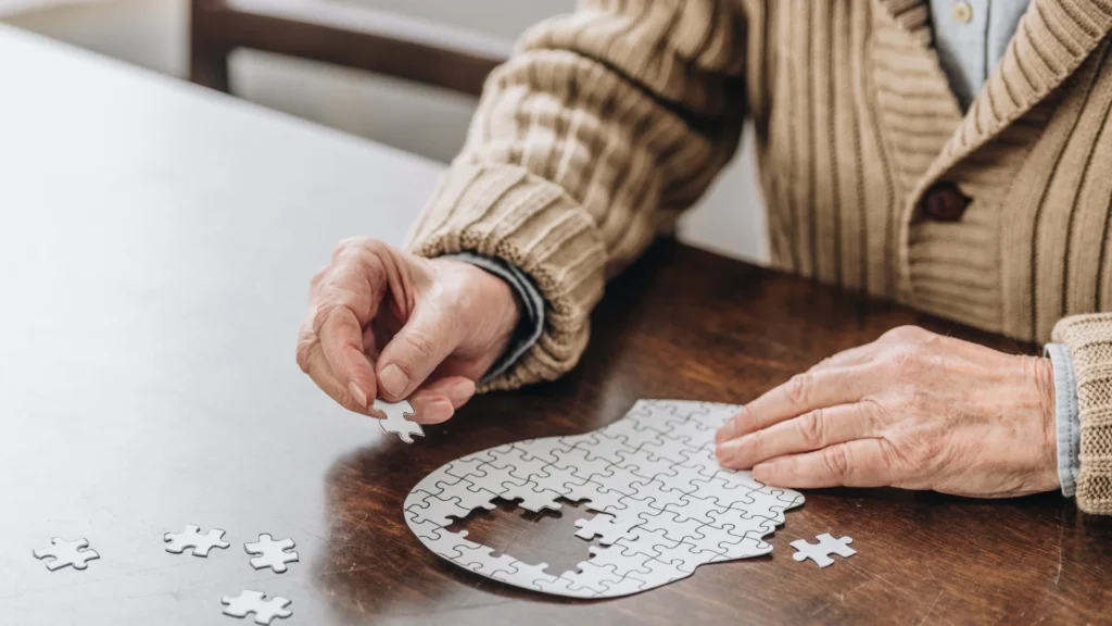 An old person playing with Best Toys for Dementia Patients