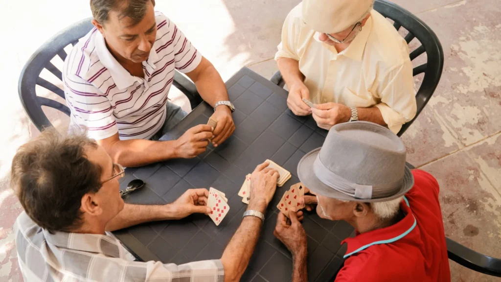 A group elders playing Card Games for Dementia Patients