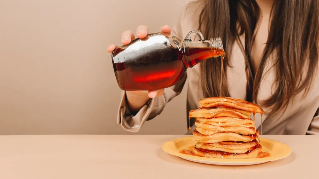 A woman using the Best Sugar Free Syrup