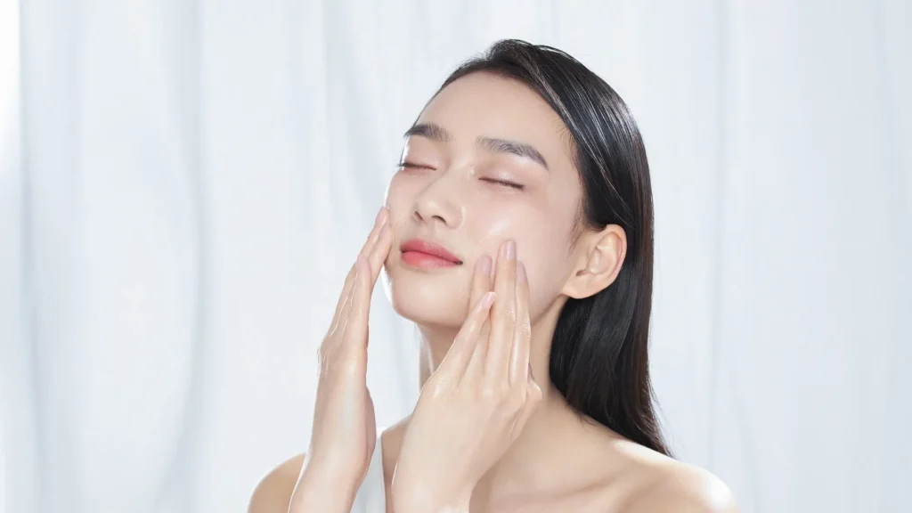 A woman using the best hydrating face mask