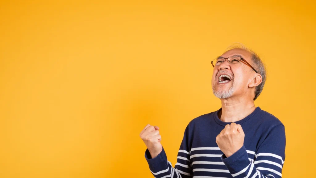 An old man eating the best weight gain supplement for elderly