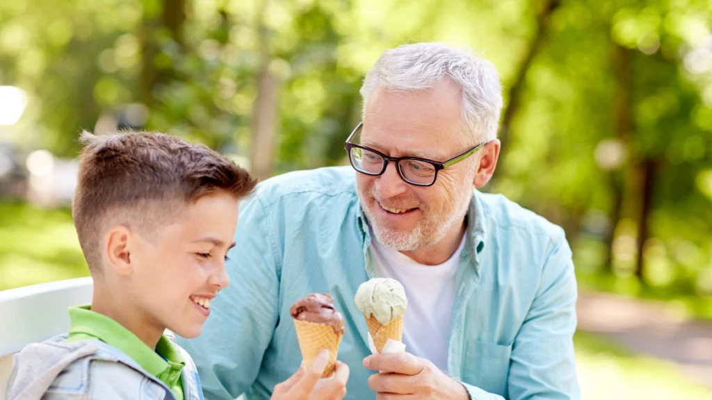 A father and son enjoying the best sugar free ice cream for diabetics