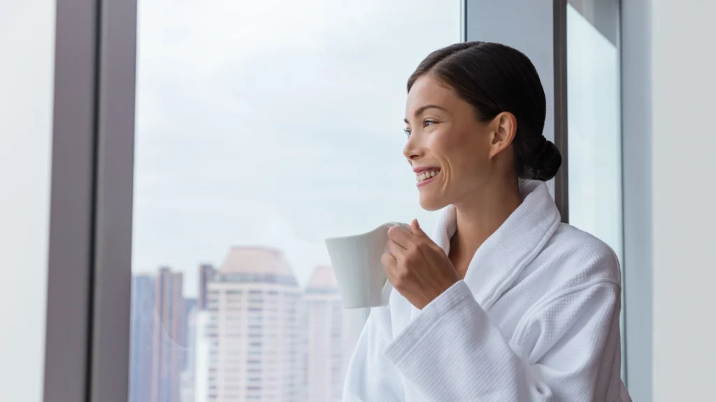 A woman enjoying the best stevia for coffee