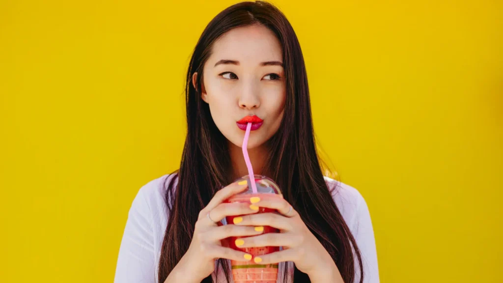 A woman drinking the best fruits to juice