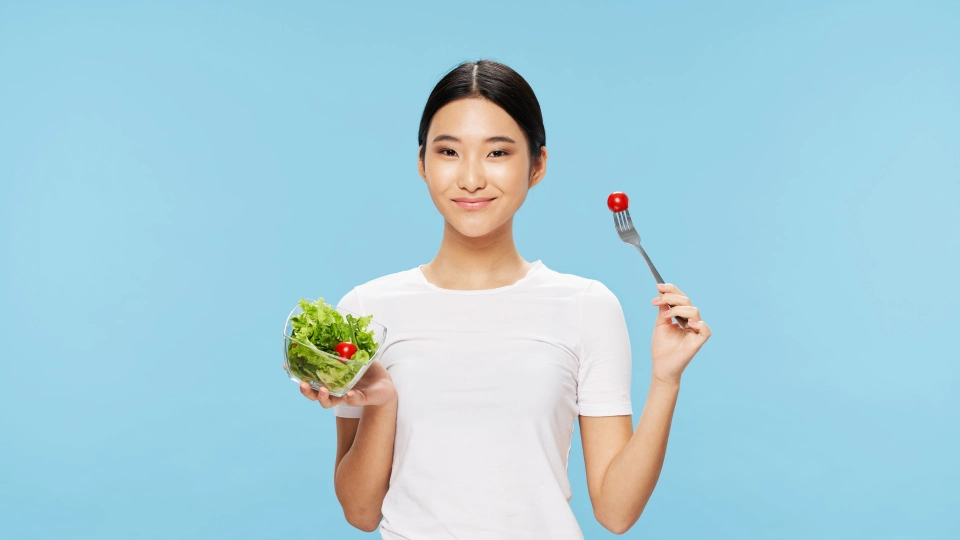 A woman using the best fruits and veggies supplement