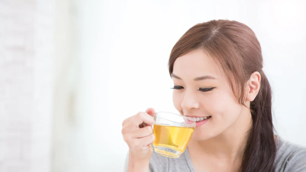 A mother enjoying the best postpartum tea